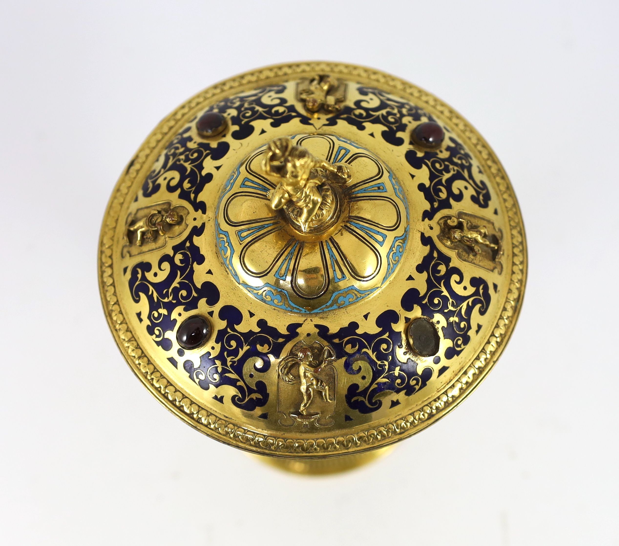 A Victorian enamel and gilt metal pedestal cup and cover in the Renaissance style, Elkington & Co, circa 1880, 24cm high, 14.5cm diameter.